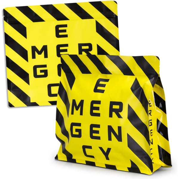 A large foil flat bottom pouch in bright yellow and black with a bold pattern and a logo.