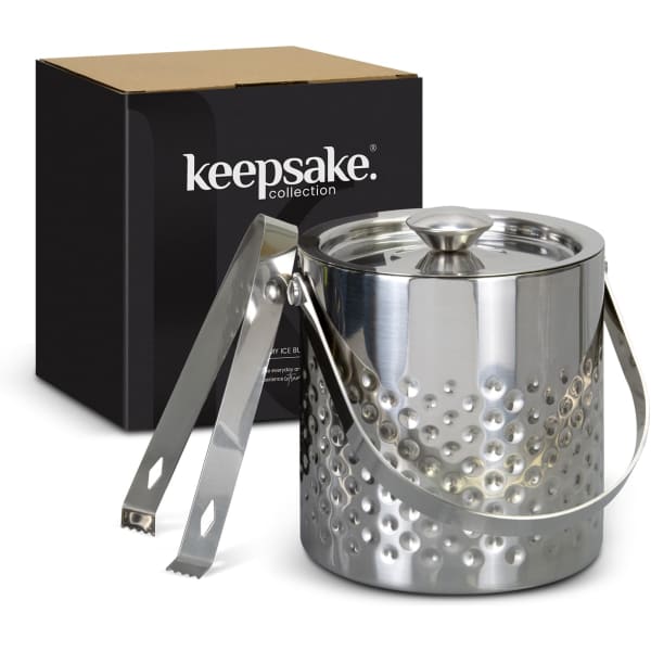 A sleek silver ice bucket with a dotted design, accompanied by tongs, packaged in a black box featuring a logo.