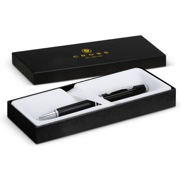 A sleek black ballpoint pen placed inside a black presentation box with a white interior. The box has a logo.