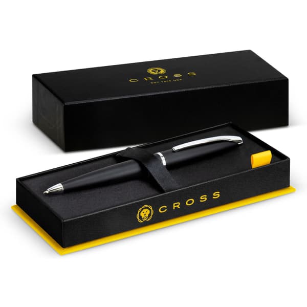 A black Cross ATX ballpoint pen in a black and yellow gift box with an accompanying logo.
