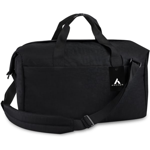 A black duffle bag with a shoulder strap, featuring handles and a logo tag.