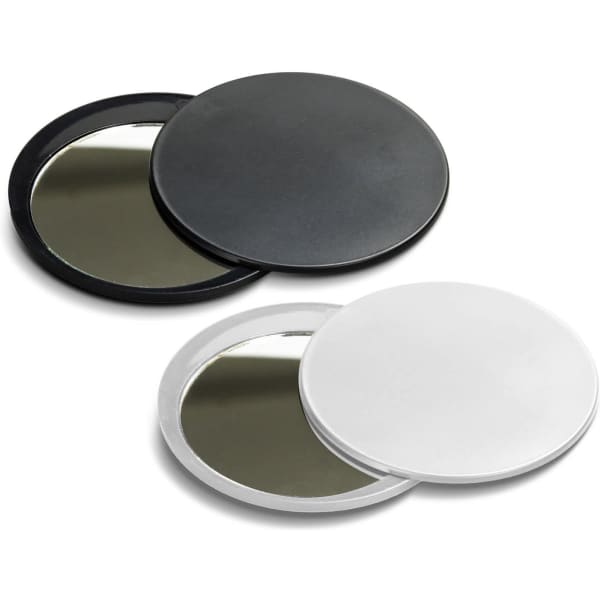 A compact mirror set featuring two circular mirrors, one black and one white, with a reflective surface.