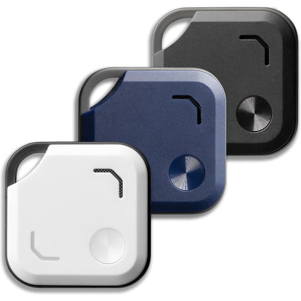 Three VibeTag Bluetooth trackers in white, navy blue, and black, featuring a circular button and a logo on each.