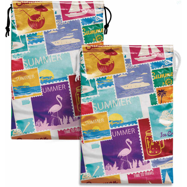 Two large satin gift bags featuring a colourful travel-themed design with various tropical motifs and a logo.