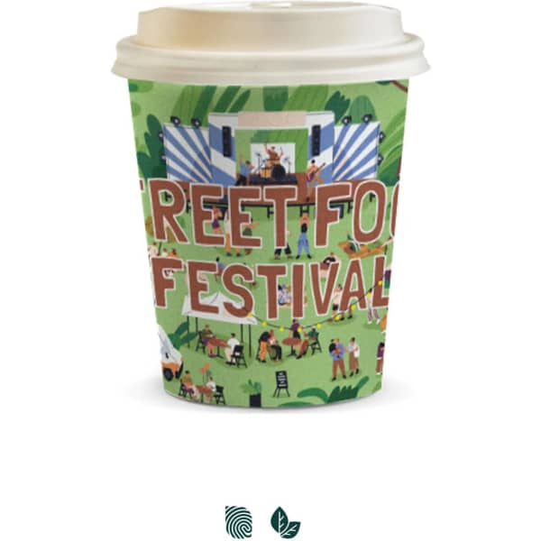 A compostable paper coffee cup with a vibrant design featuring various festival scenes in green, brown, and other colours.