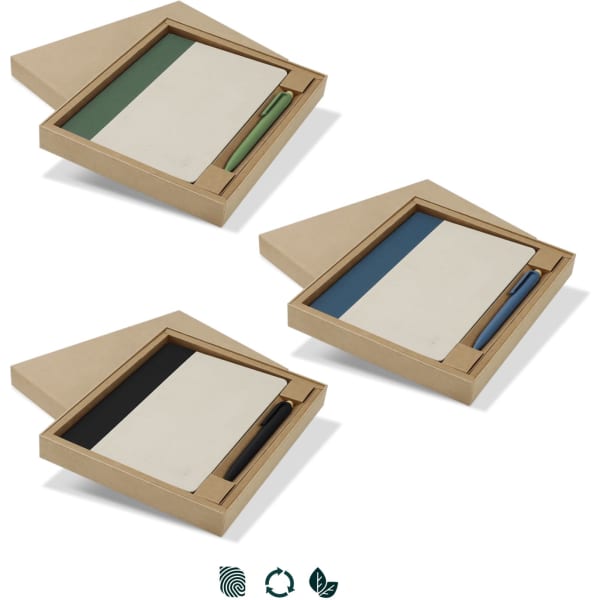 A gift set featuring a notebook in cream with green, blue, or black covers and a matching pen, presented in a stylish box.