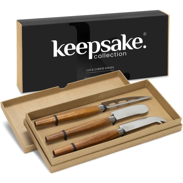 A set of three cheese knives with wooden handles in a presentation box, featuring a logo.