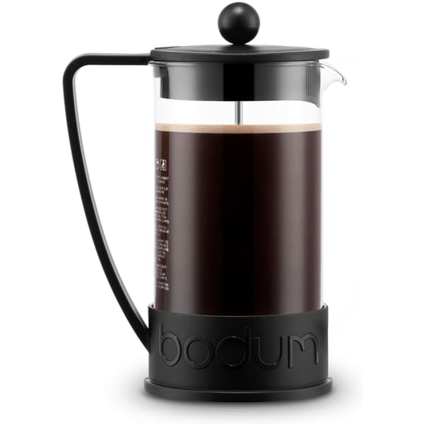 A French press in black with a glass body, featuring a round plunger and handle, designed for brewing coffee.