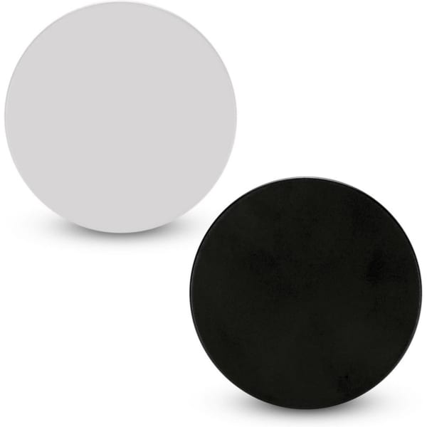 A set of two circular badges, one in black and one in grey, with a smooth surface and a logo on each.