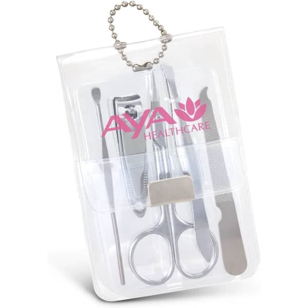 A vinyl manicure set in a clear case, featuring various silver nail care tools and a logo.