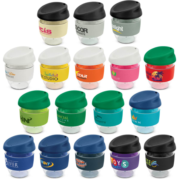A collection of reusable coffee cups in various colours, each featuring a logo and a black lid.