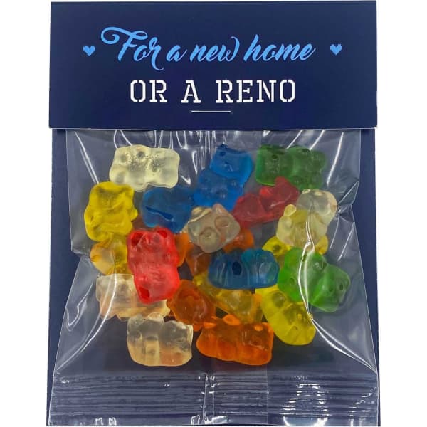 A bag containing colourful gummy bears in various shades, placed within a clear plastic packet with a decorative header.