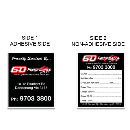 A black promotional label with adhesive on one side and non-adhesive on the other, featuring a logo and contact information.