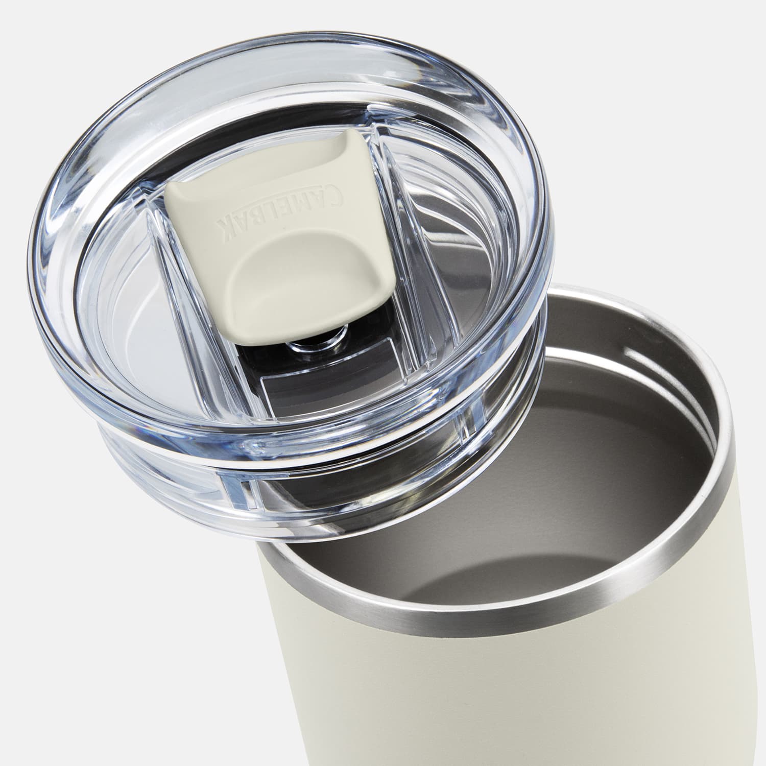 A drink bottle with a stainless steel body, featuring a clear lid and a white push button. It has a sleek design.