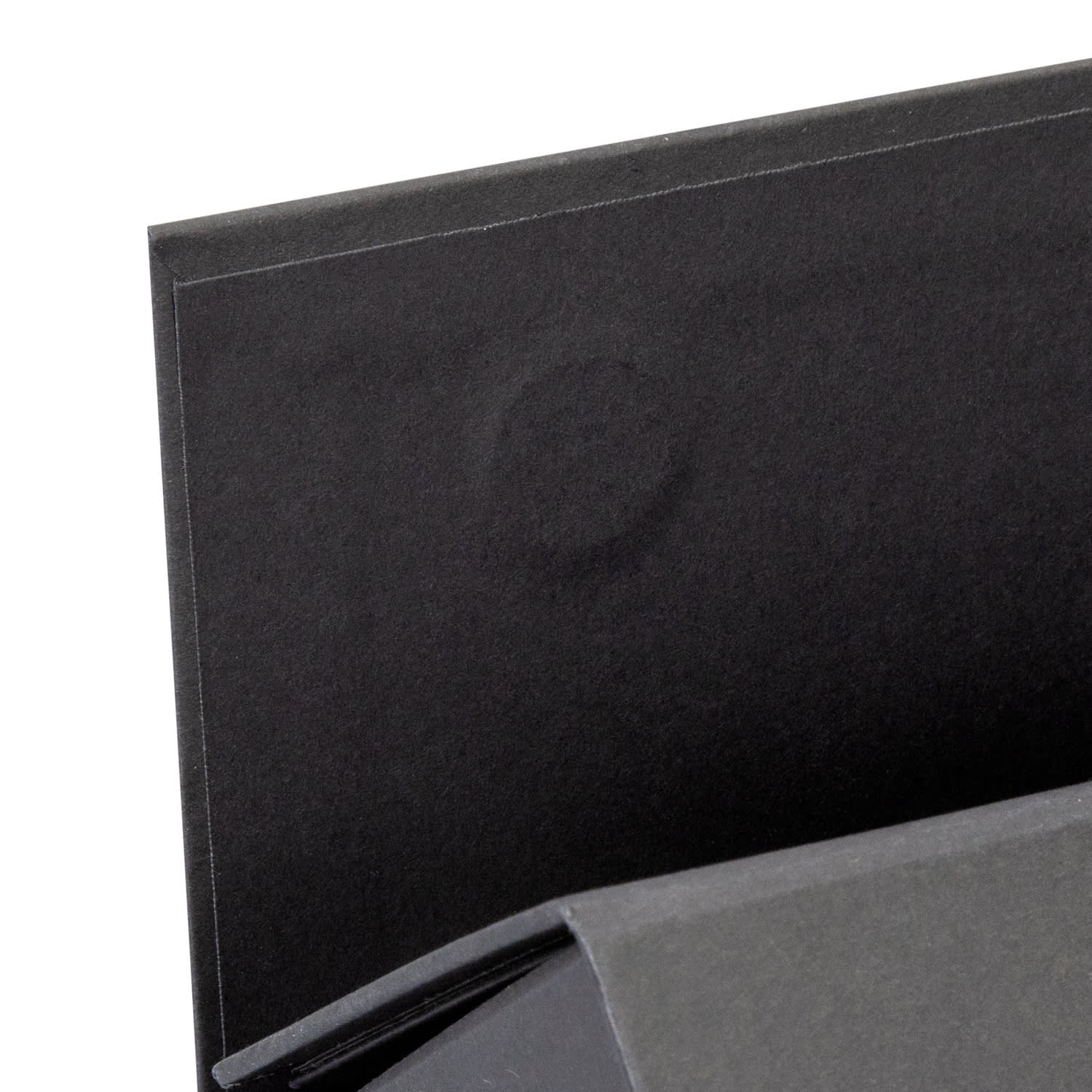 A black gift box with a simple design, featuring a partially visible inner layer for holding wine bottles.
