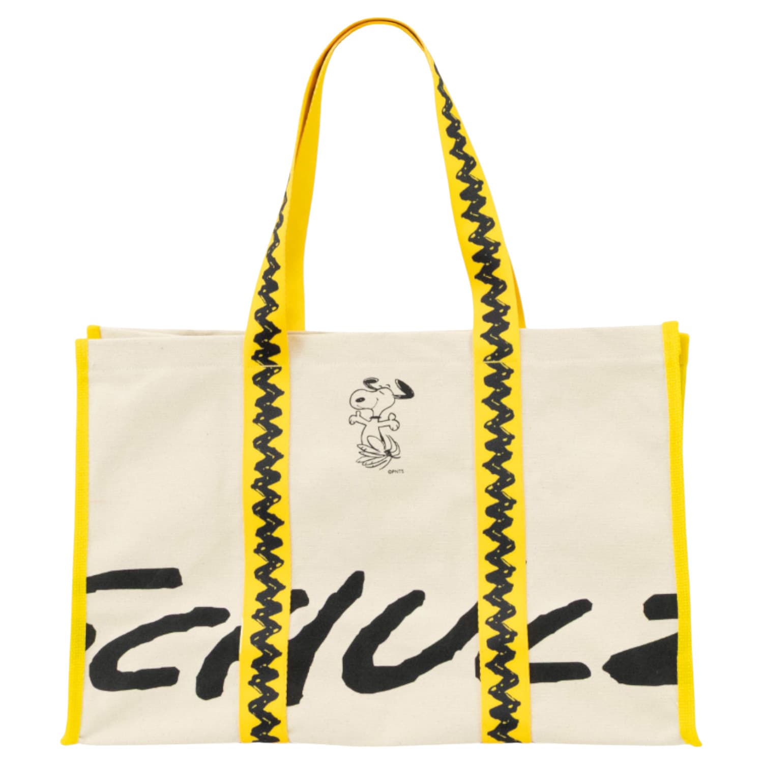 A heavy canvas tote bag in cream with yellow handles, featuring a graphic and branding.