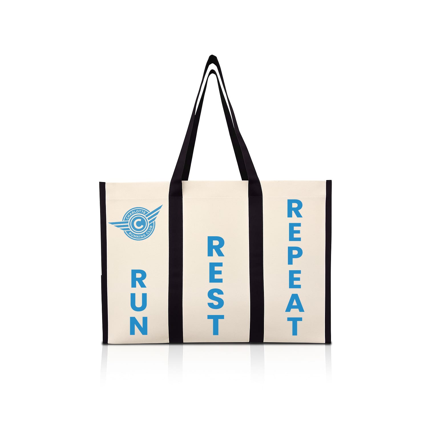 A heavy canvas tote bag in cream with navy handles and a logo, featuring the words "RUN REST REPEAT."