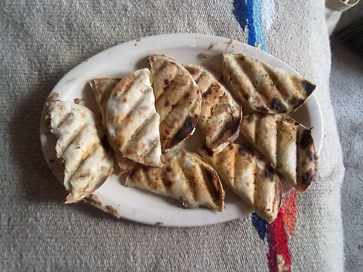 Taco con frijoles refritos. Taco con frijoles refritos.