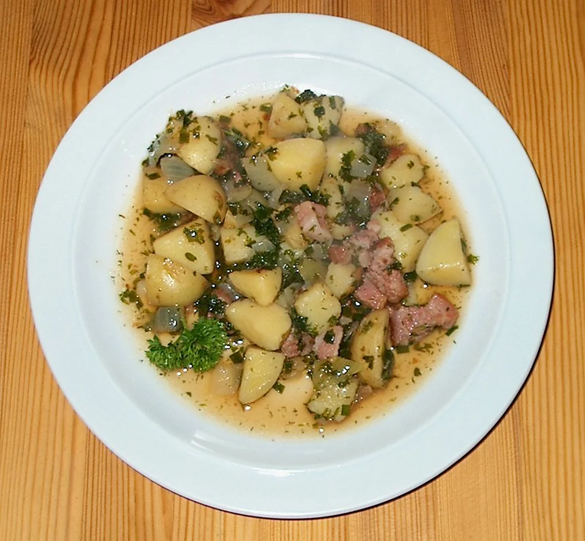 Kartoffelret med krydderurter og bacon. Kartoffelret med krydderurter og bacon.