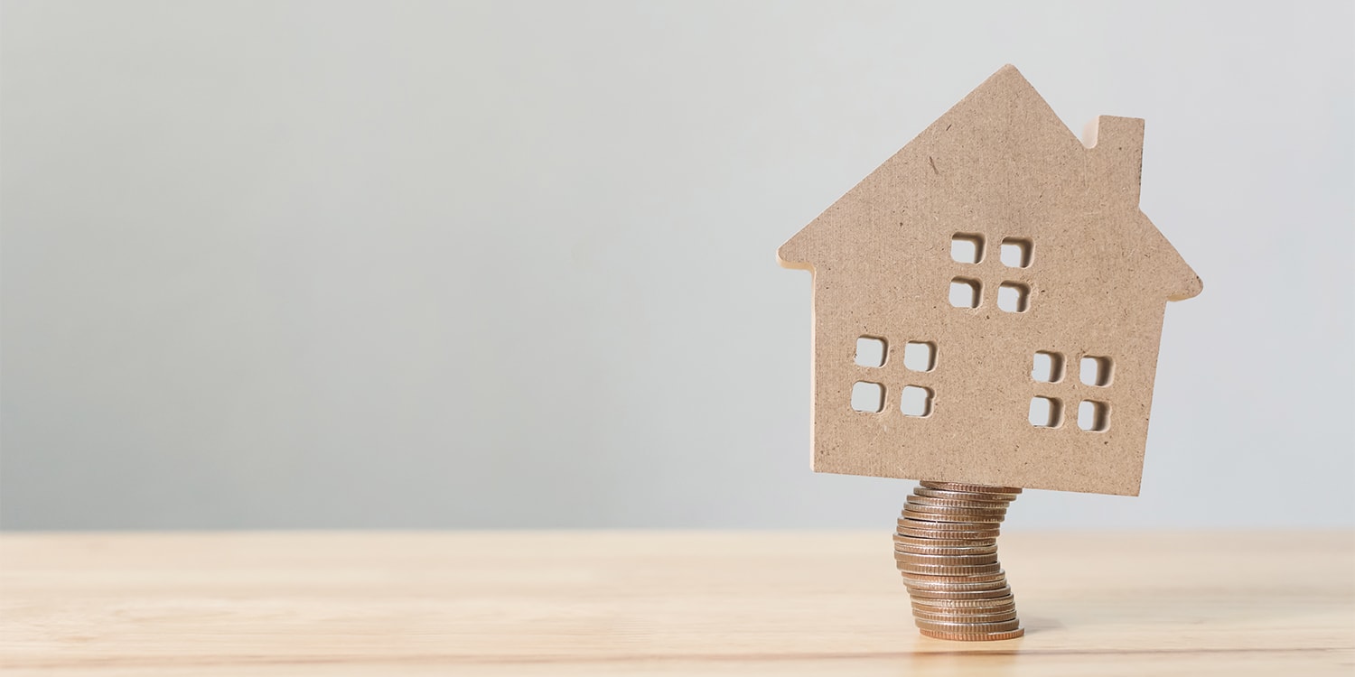 House on stack of coins to represent home selling price