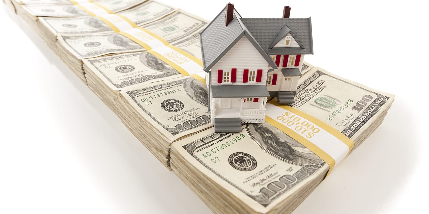 Cash home sale - house on top of money