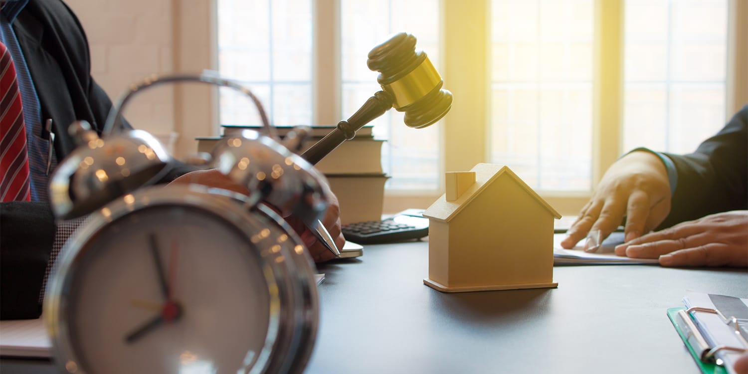 Real estate investor buying foreclosed homes