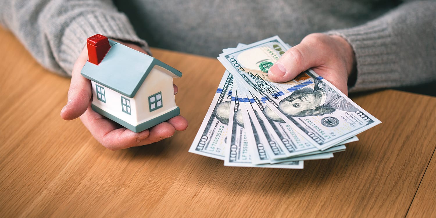 Person buying a house with cash