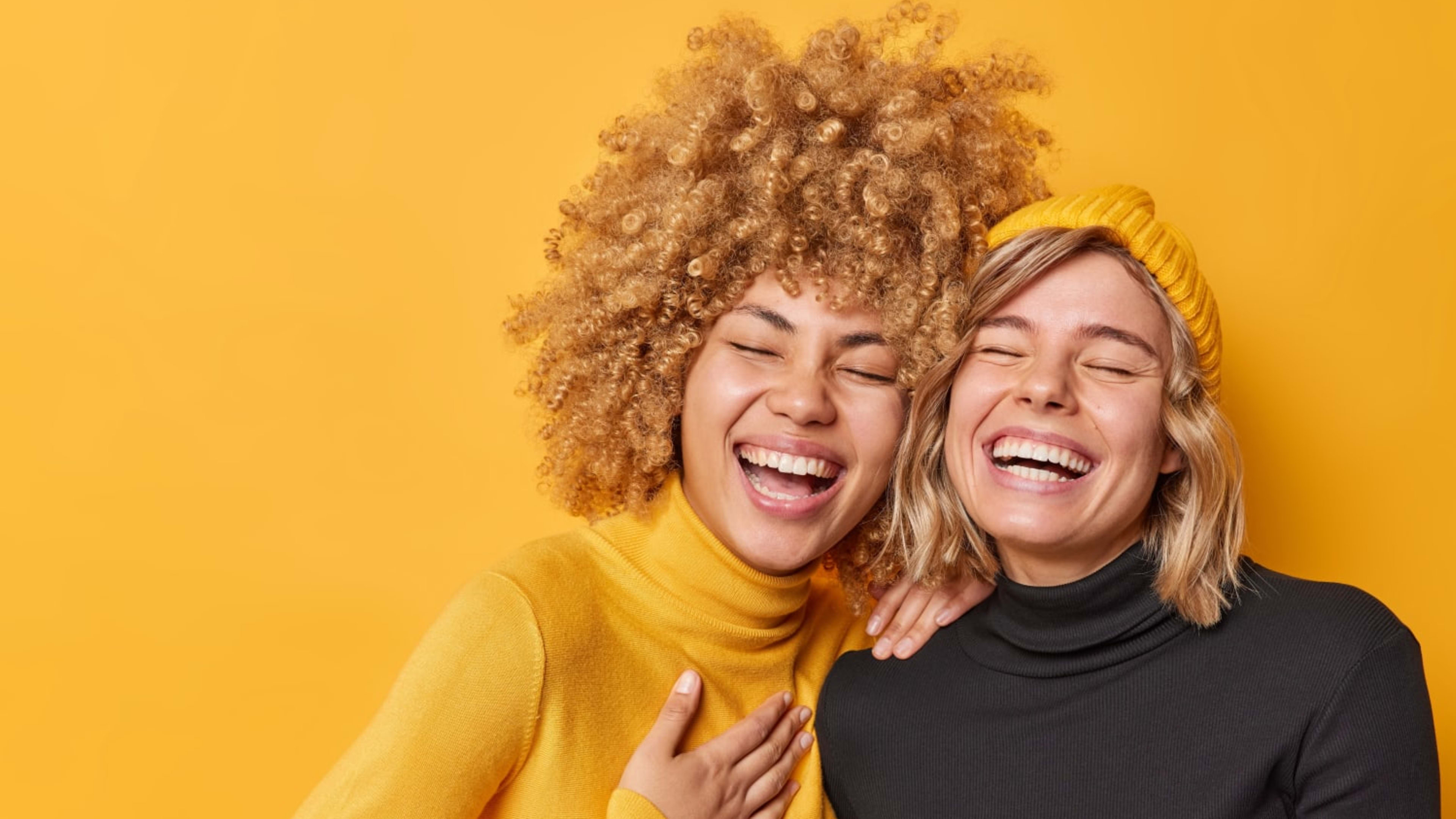 A picture of two woman with yellow theme