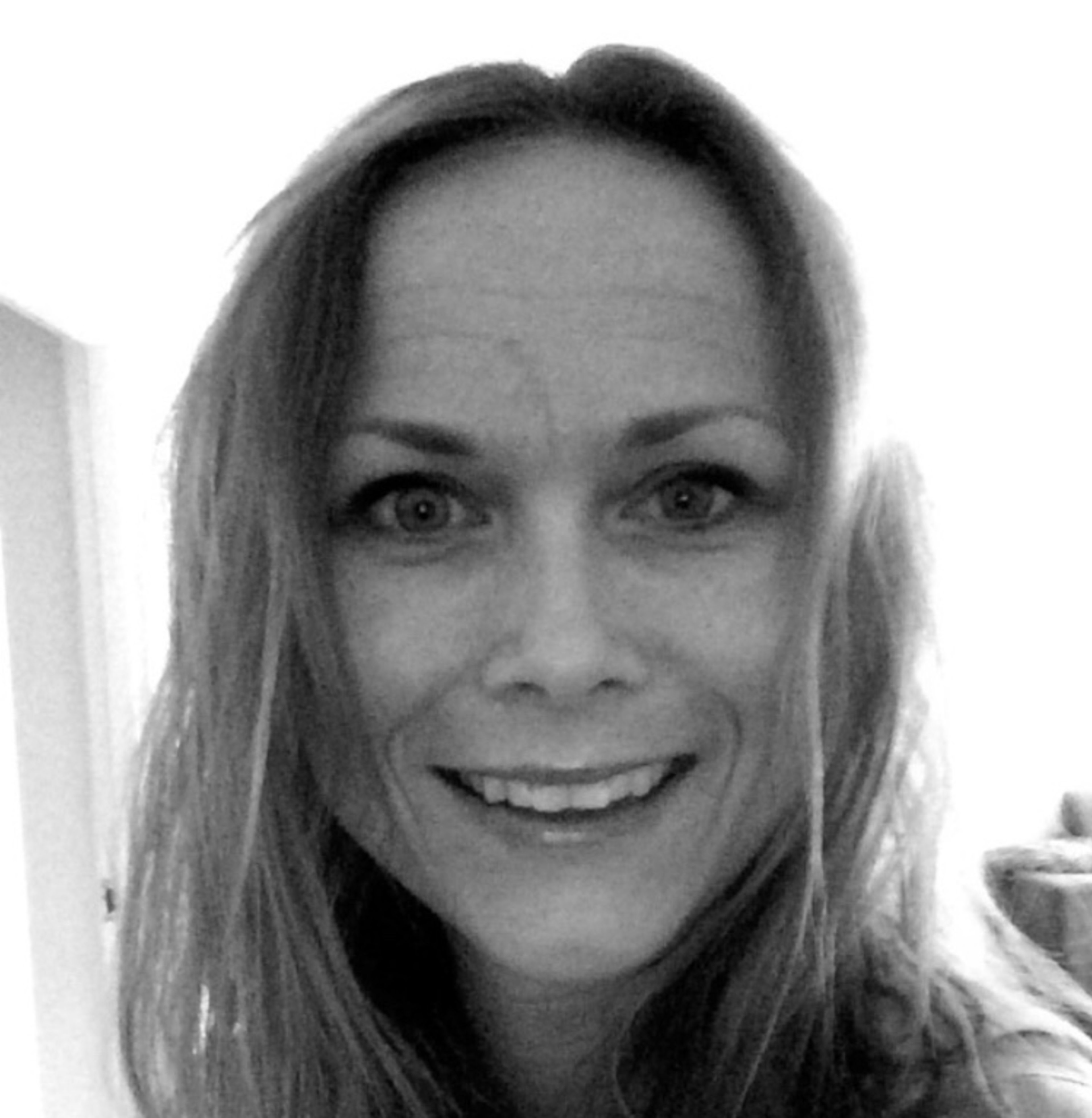 Portrett av ansatt i sort-hvitt