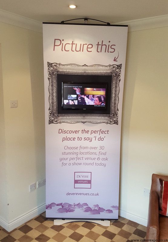 Media Twist Banner Stand An Lcd Screen Makes An Interactive