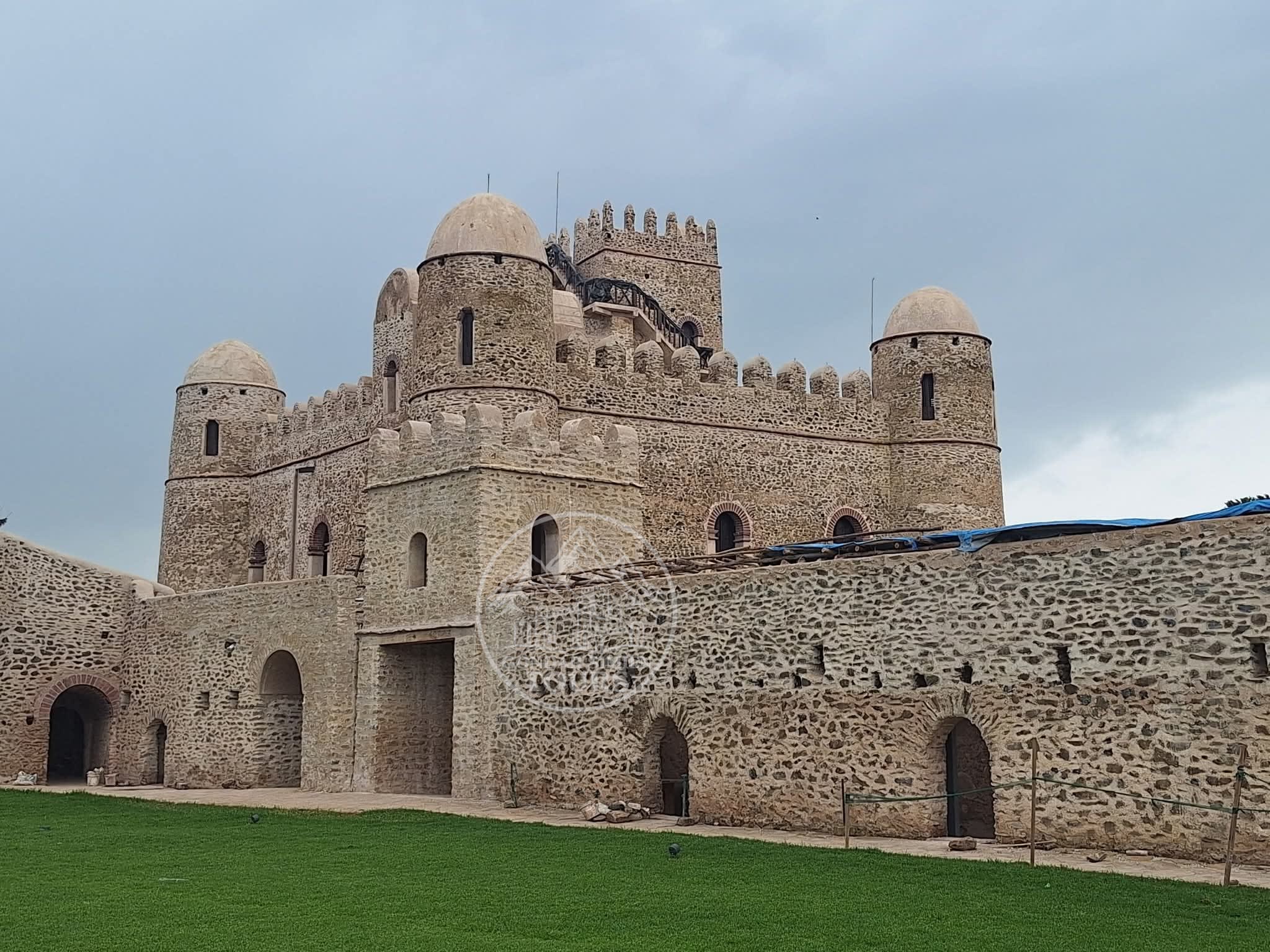 Stone castle and towers at Fasil Ghebbi in Gondar