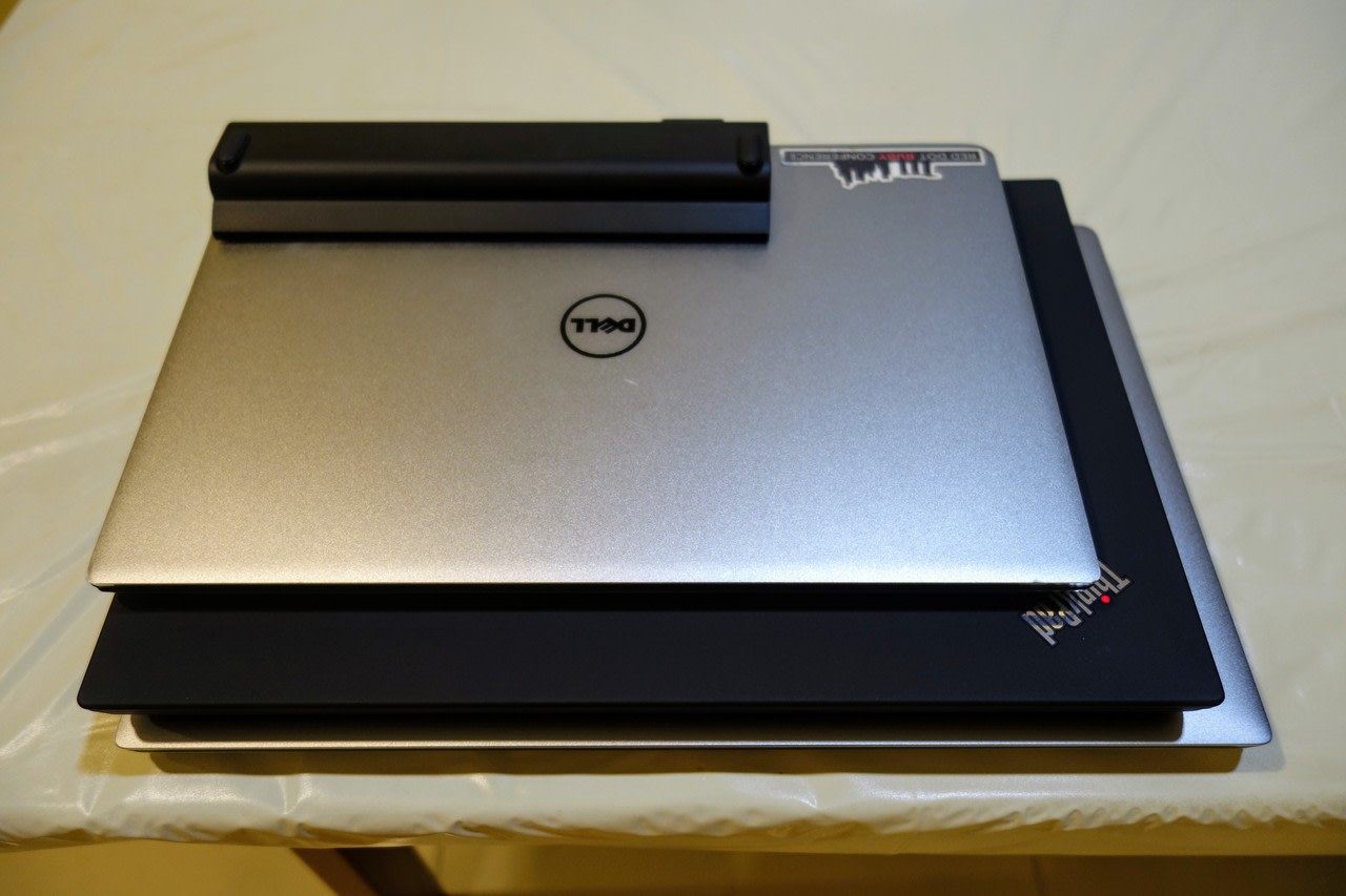 The XPS 15 9560, Thinkpad T480, and XPS 13 9343 on top of each other