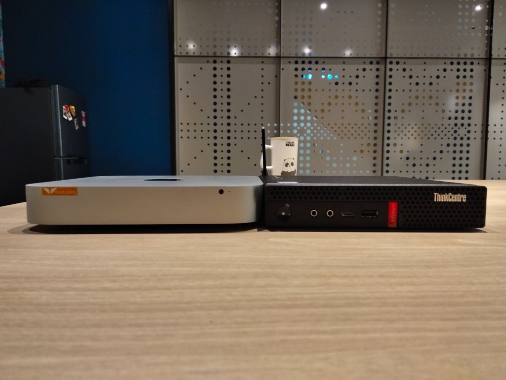 Mac Mini and ThinkCentre Tiny side by side