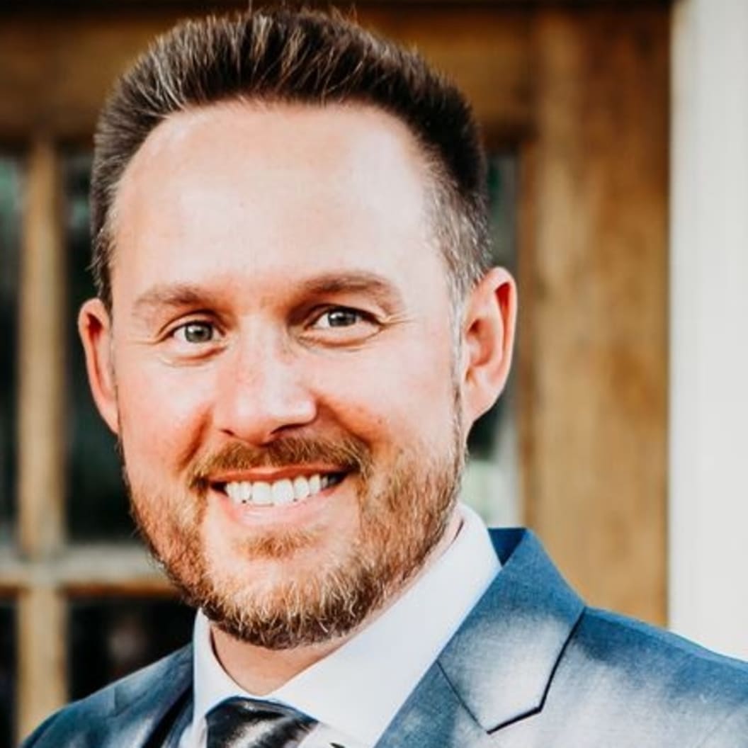 A circular avatar of Andrew Lumb