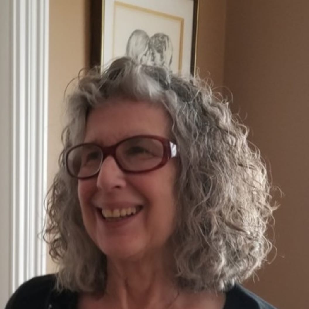 A circular avatar of Judith Epstein