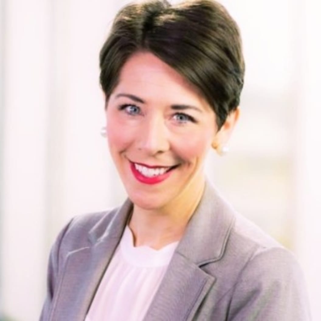 A circular avatar of Katie M. Christenson, EdD