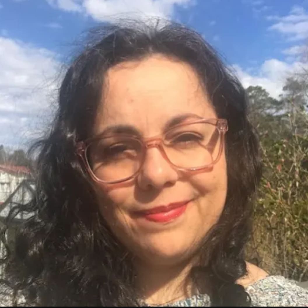 A circular avatar of Marta Coelho
