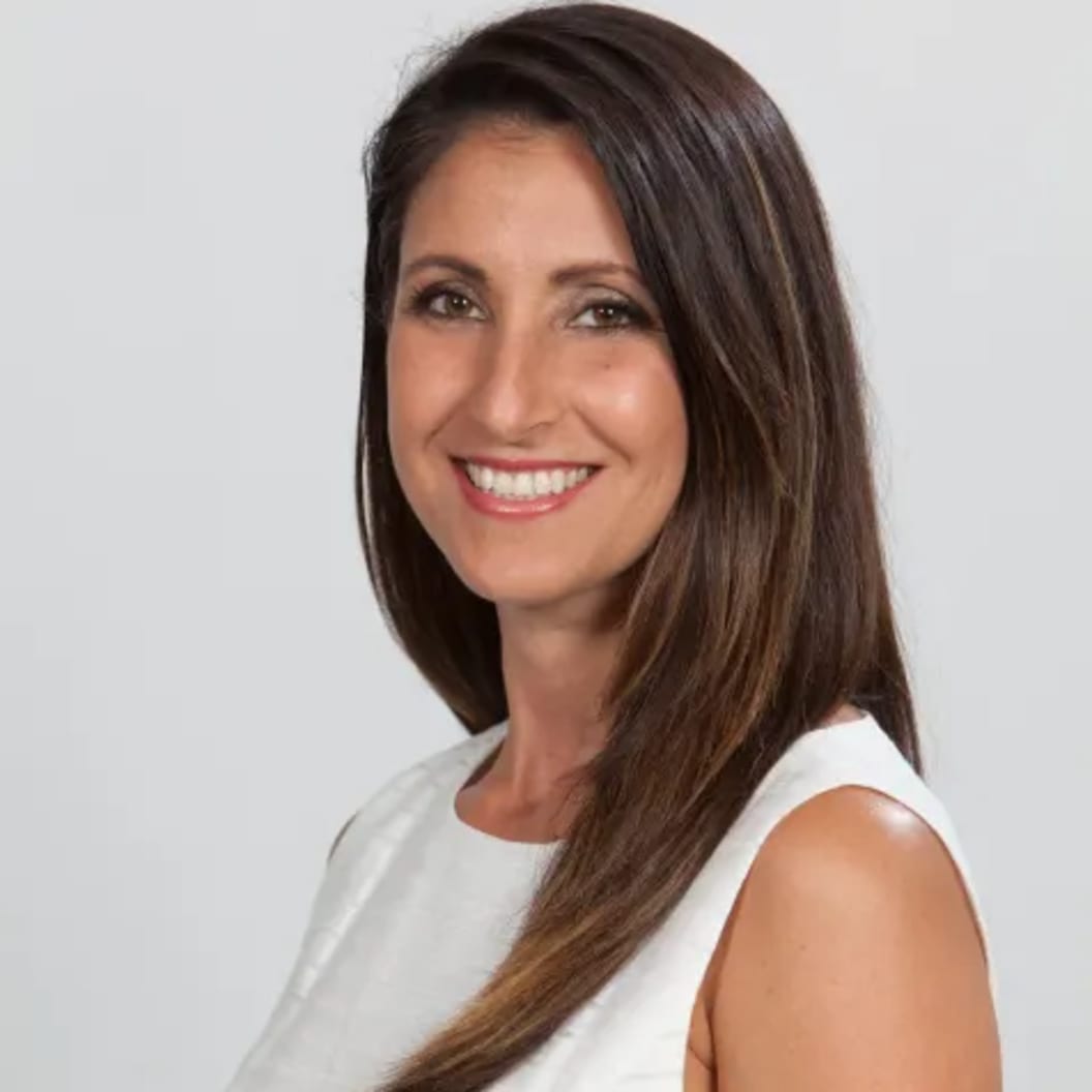 A circular avatar of Andrea Moscoso
