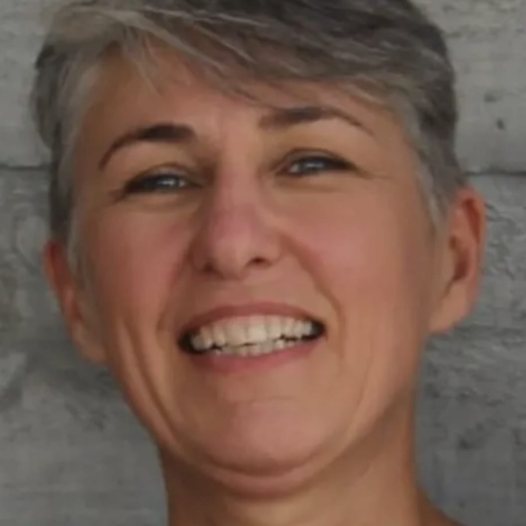 A circular avatar of Denise Holloway