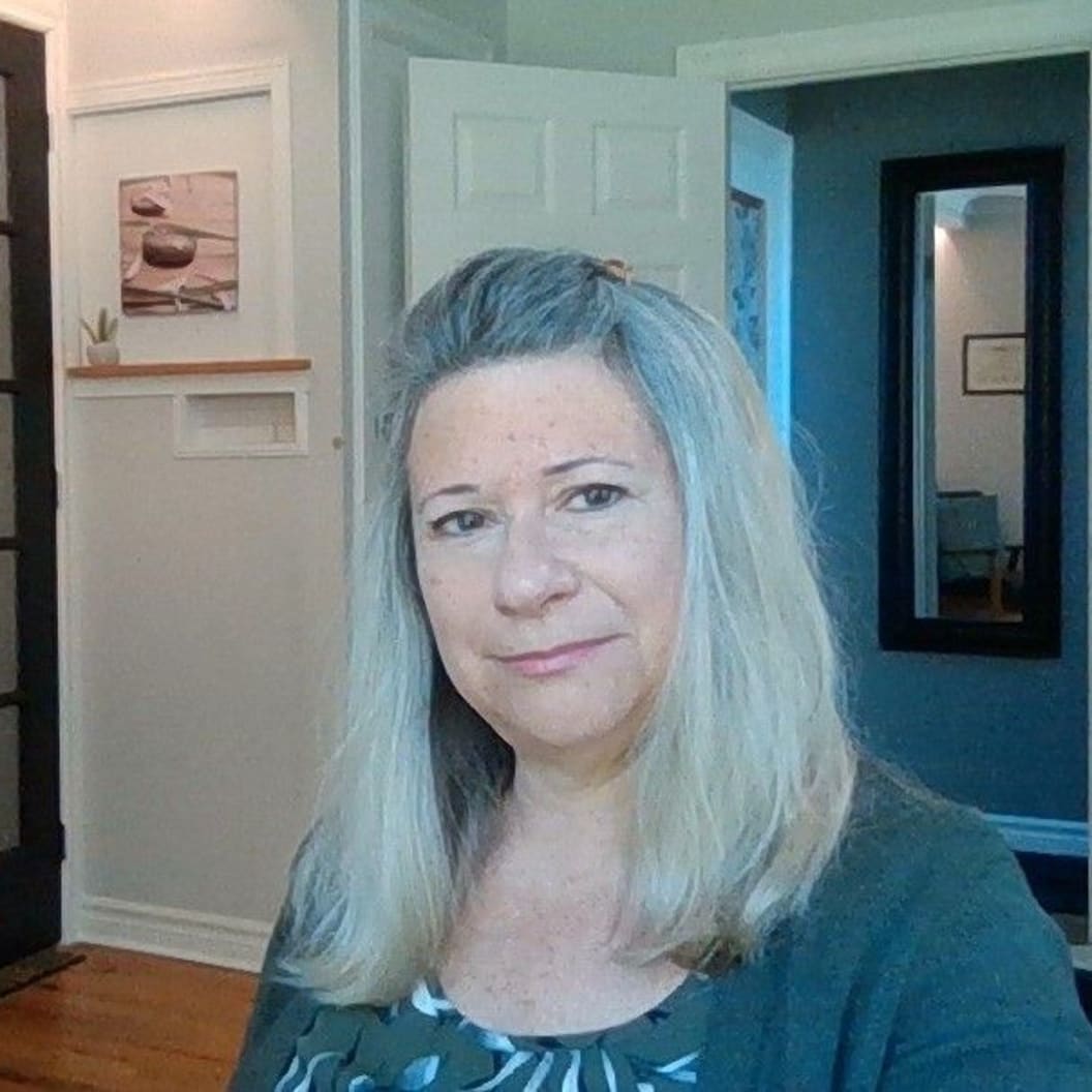 A circular avatar of Denise Quirion
