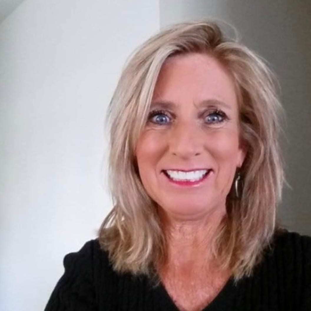 A circular avatar of Connie Reinhard