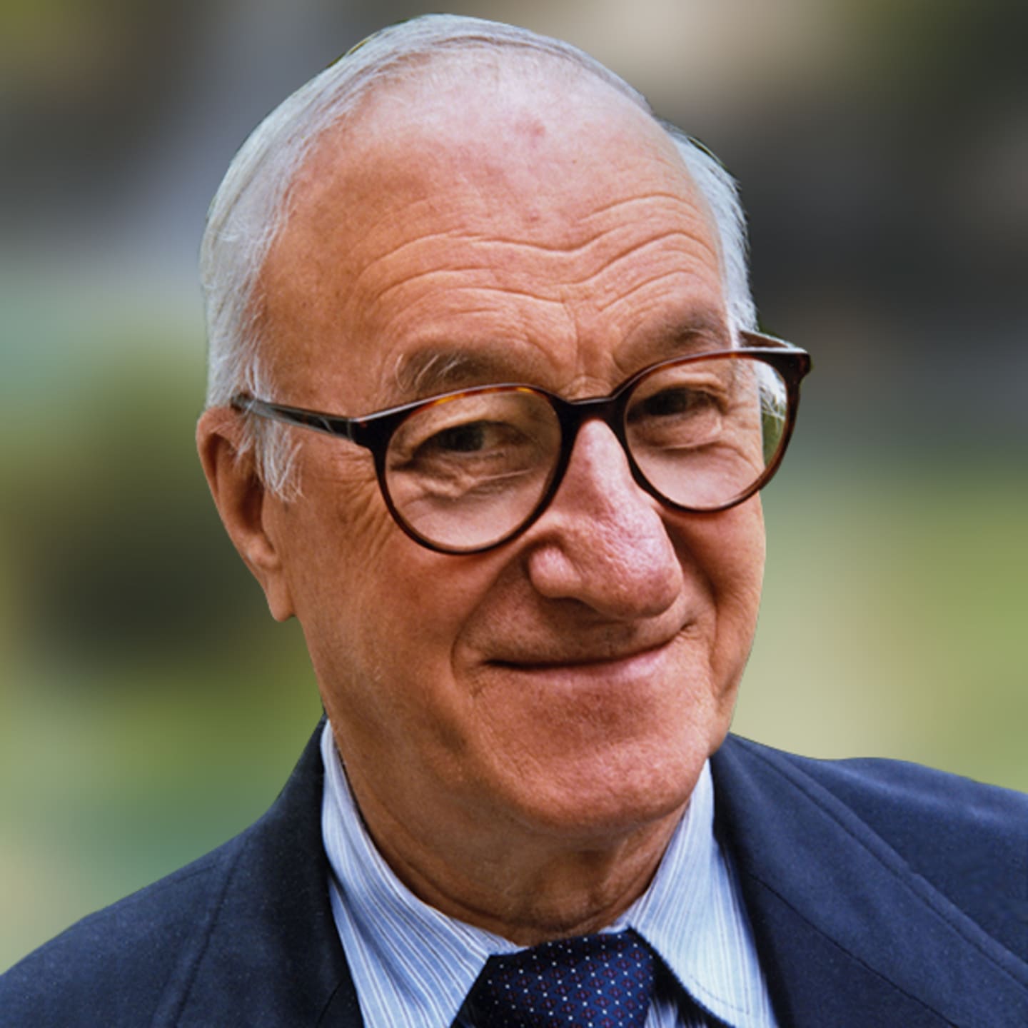 A circular avatar of Albert Bandura