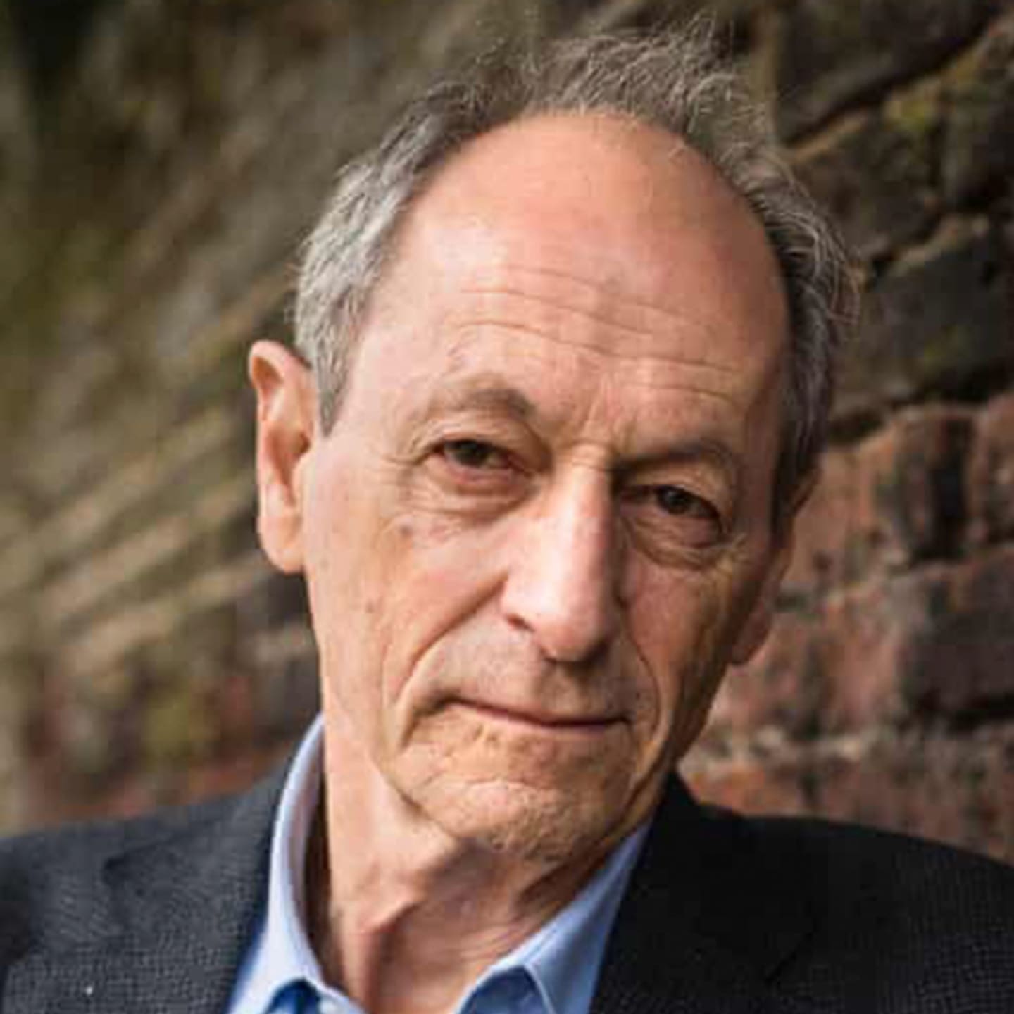 A circular avatar of Michael Marmot
