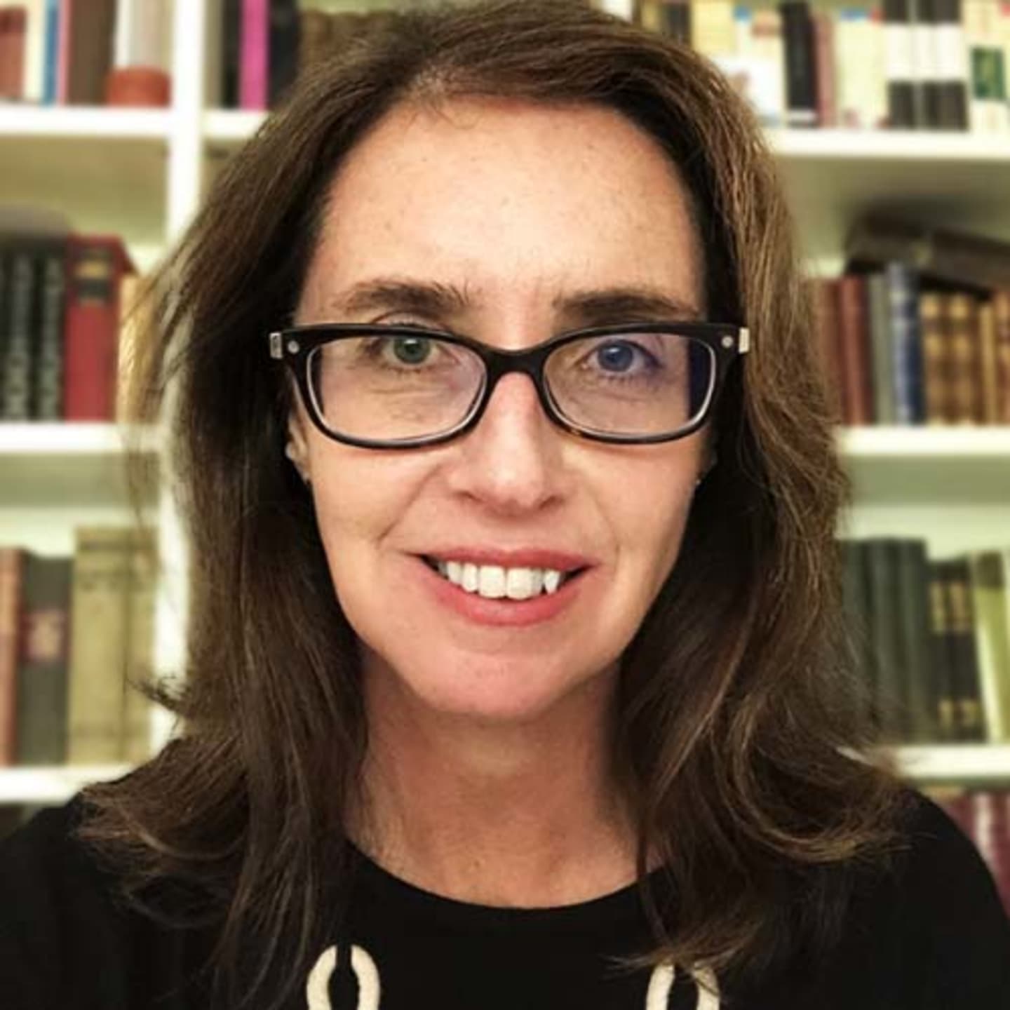 A circular avatar of Carla Sharp