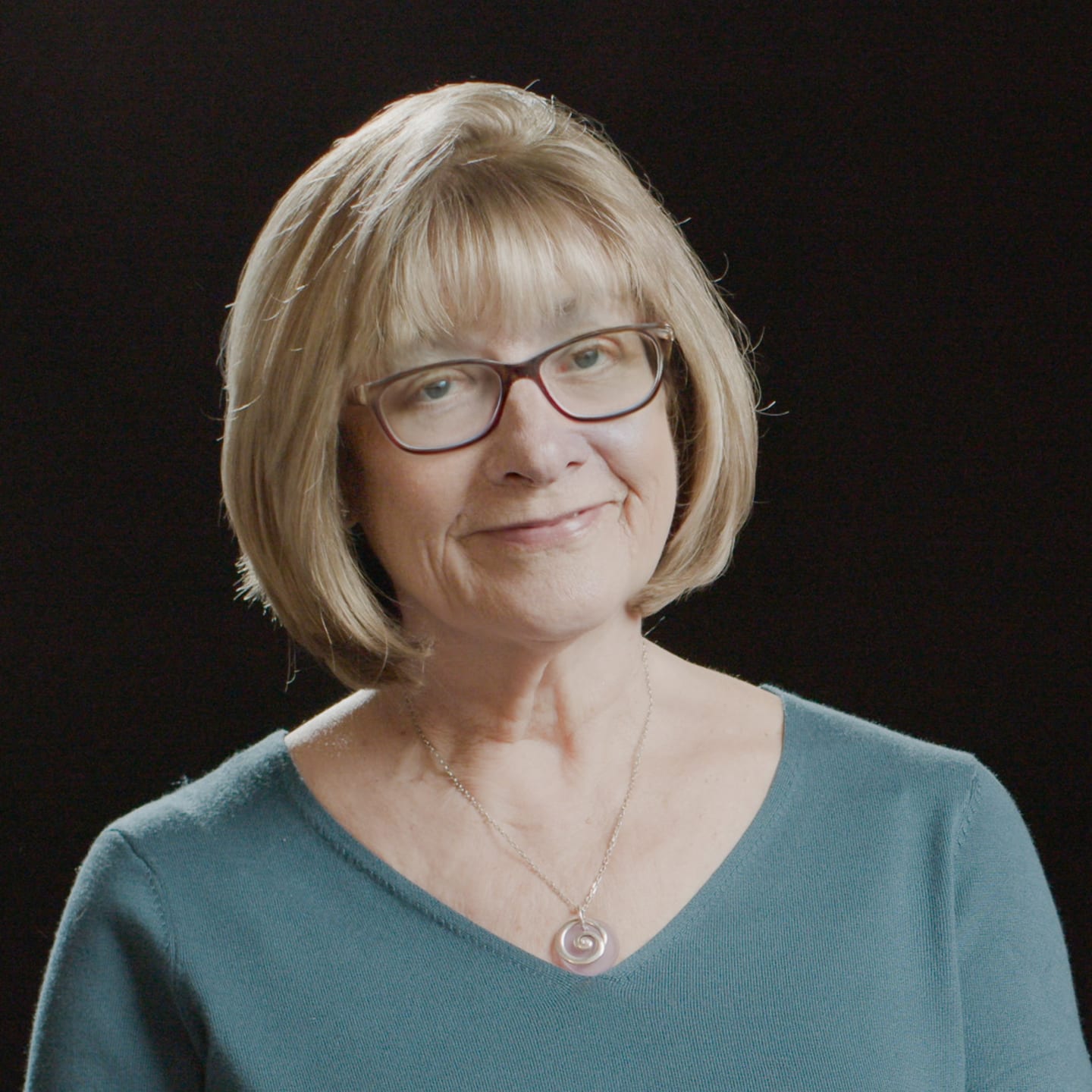 A circular avatar of Carolyn Settle