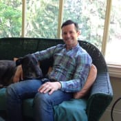 A circular avatar of Dr. Andrew Patterson