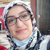 A circular avatar of Nada Al-Attili