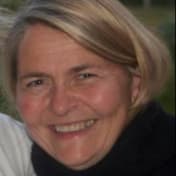 A circular avatar of Herdis Finnbogadottir
