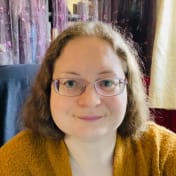 A circular avatar of Emma Ross