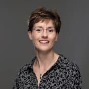 A circular avatar of Dr. Tanya Spencer